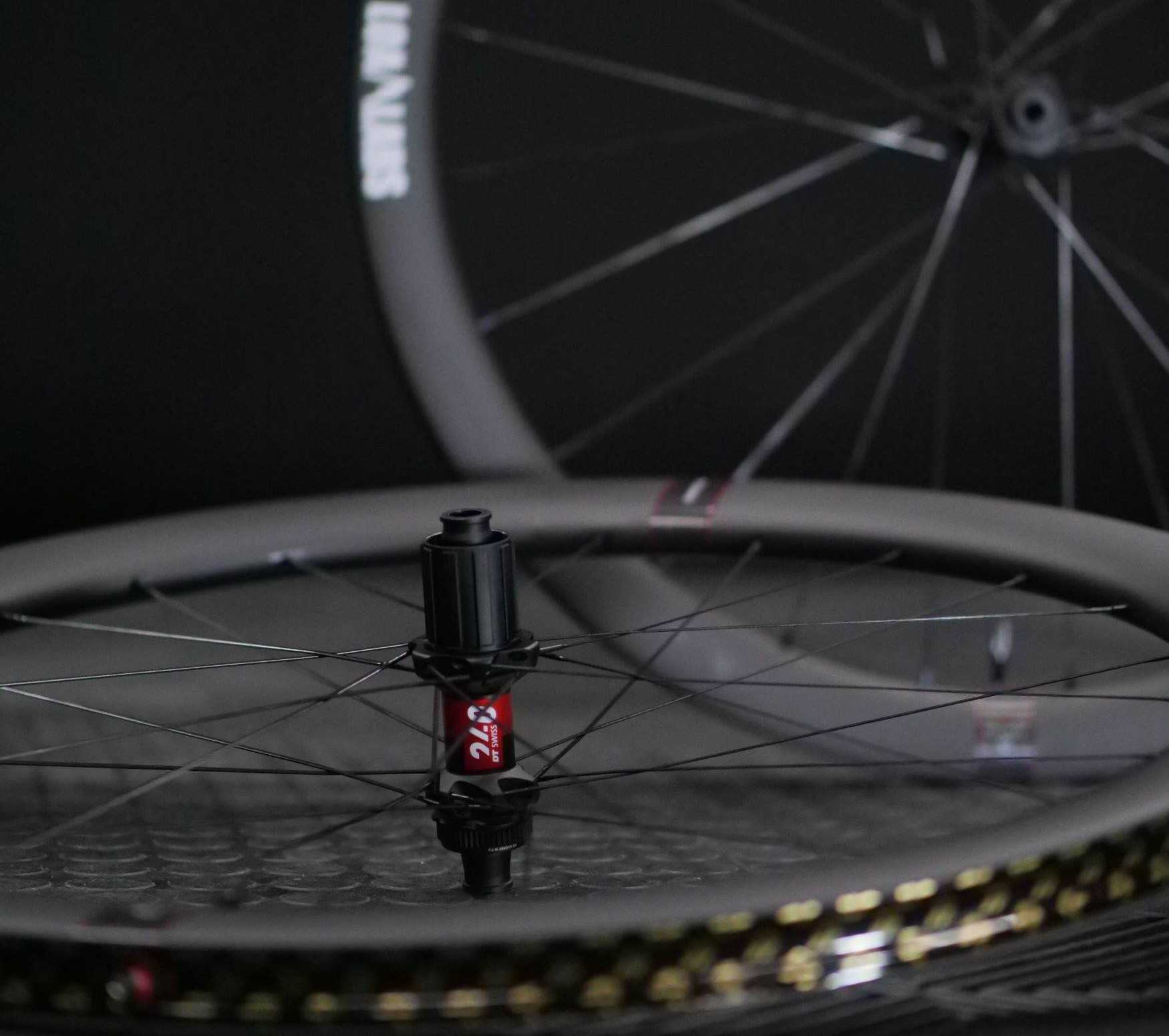 Custom wheel with Reserve 42|49 rims, DT Swiss 240 hubs, and CX-Ray spokes by LoamLabs.